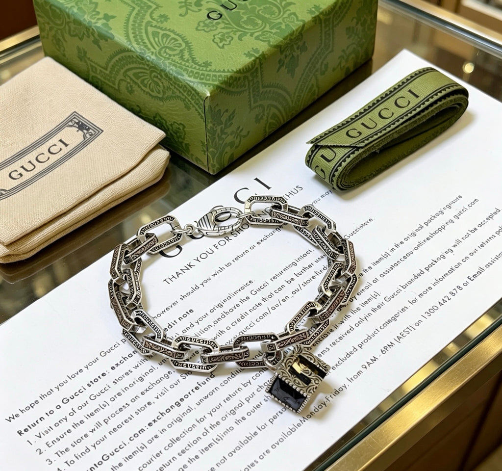 Gucci Silver-Tone Rectangular Link Bracelet with Cube Charm - album image 7
