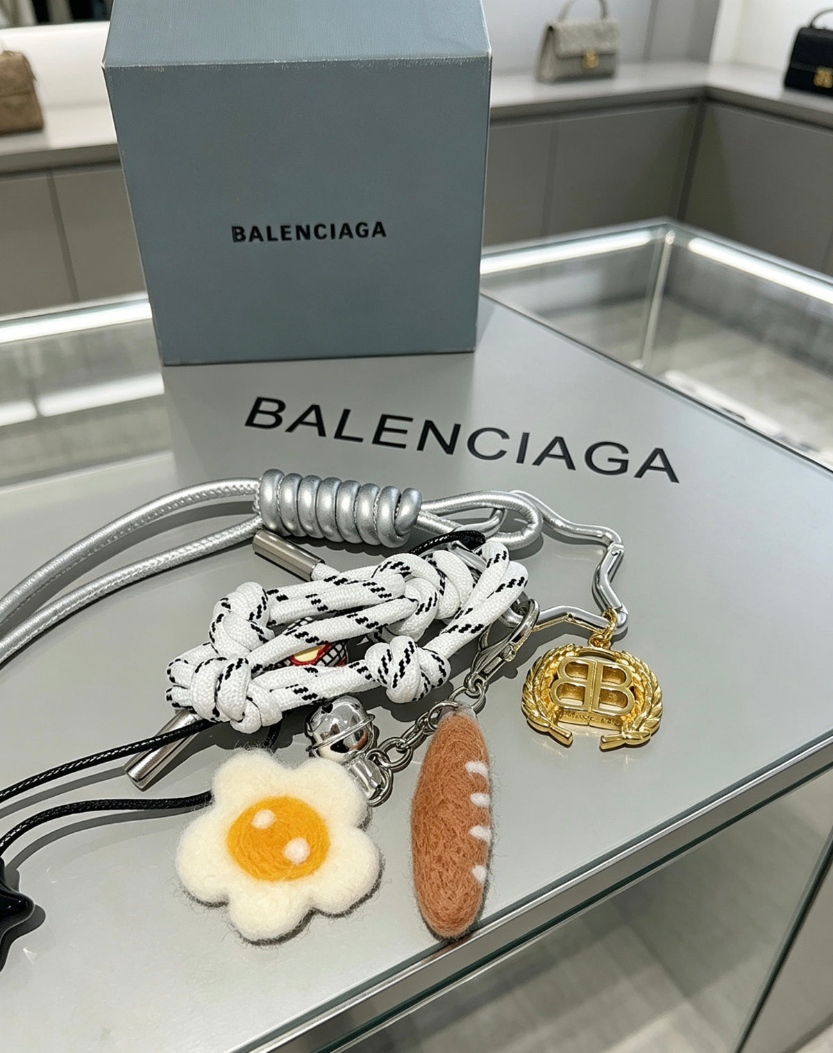Balenciaga Silver-Tone Daisy and Food Charm Keychain - album image 1