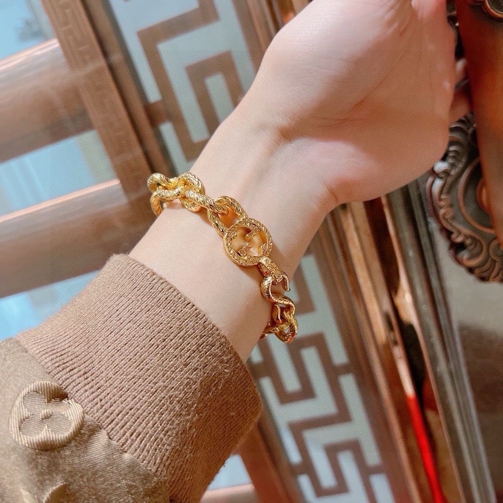 Gucci Gold-Tone Chunky Oval Link Bracelet with G Charm - album image 4
