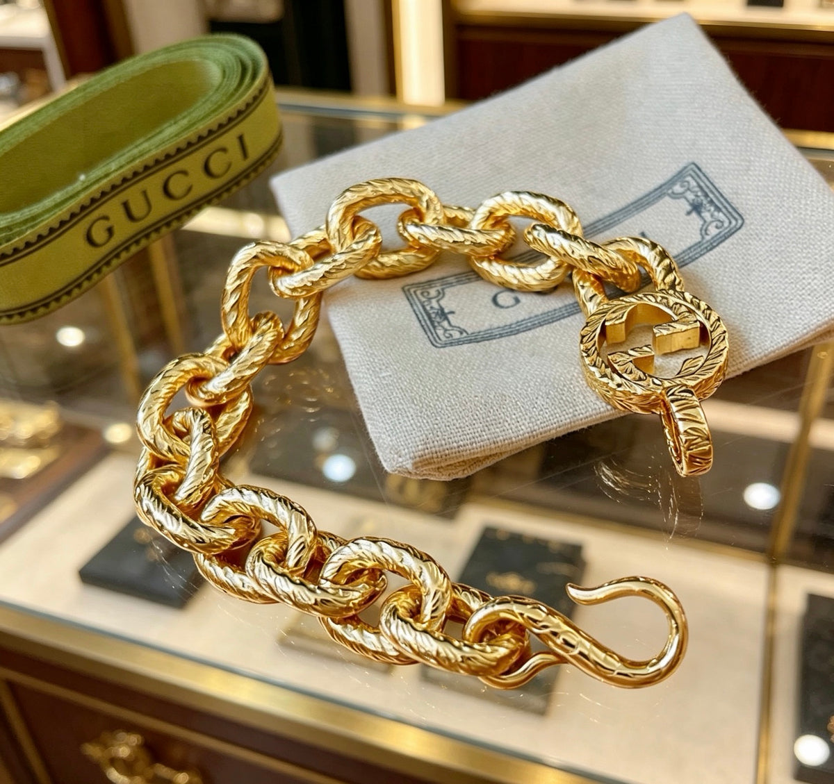 Gucci Gold-Tone Chunky Oval Link Bracelet with G Charm - album image 2