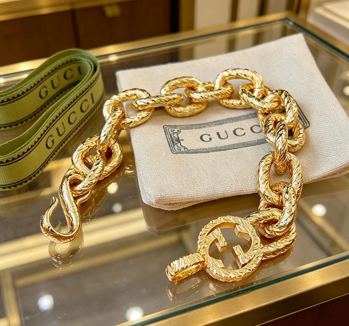 Gucci Gold-Tone Chunky Oval Link Bracelet with G Charm - album image 1