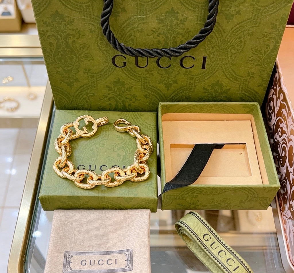 Gucci Gold-Tone Chunky Oval Link Bracelet with G Charm - album image 5