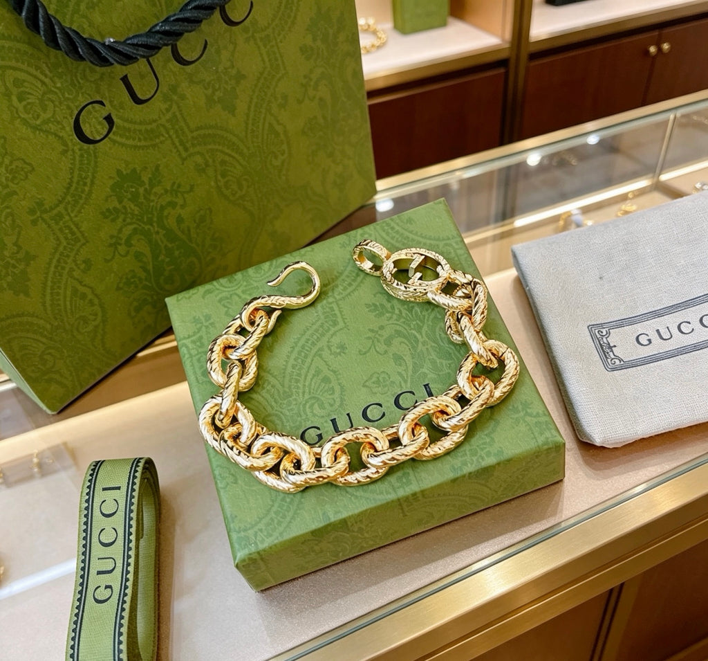 Gucci Gold-Tone Chunky Oval Link Bracelet with G Charm - album image 9