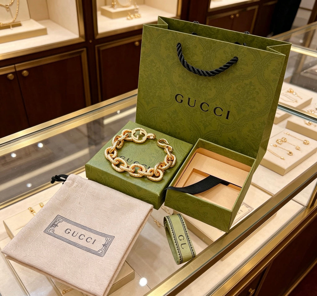 Gucci Gold-Tone Chunky Oval Link Bracelet with G Charm - album image 6