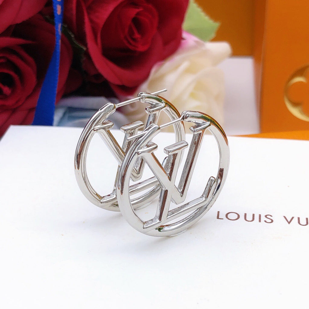 Louis Vuitton Circular Polished Earrings - album image 1