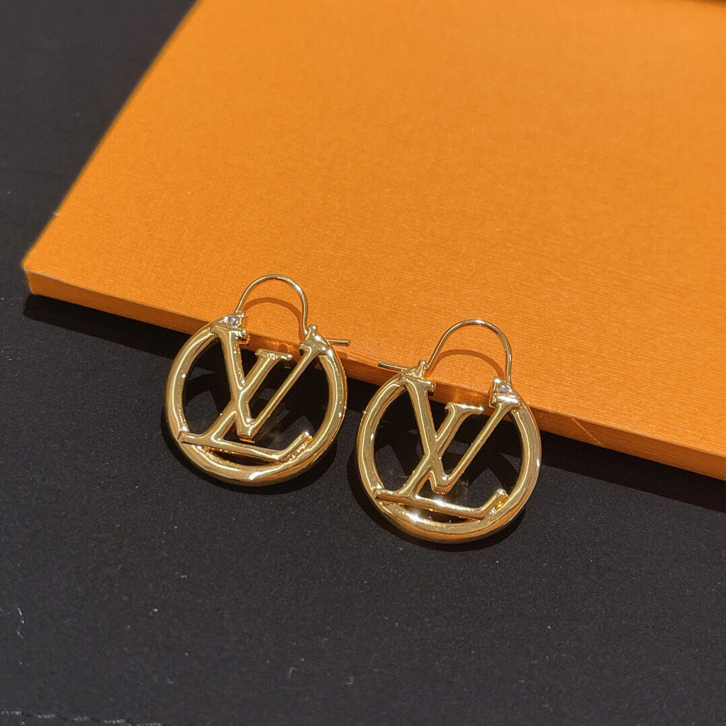 Louis Vuitton Circular Polished Earrings - album image 1