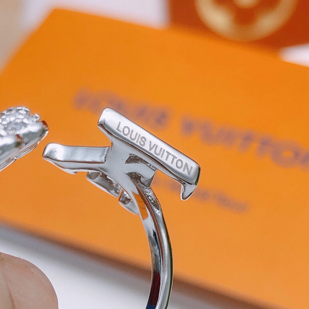 Louis Vuitton Silver-Tone Open LV and Flower Ring - album image 5
