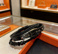 Hermès Black Leather Double-Strand Letter Bracelet - album image 1