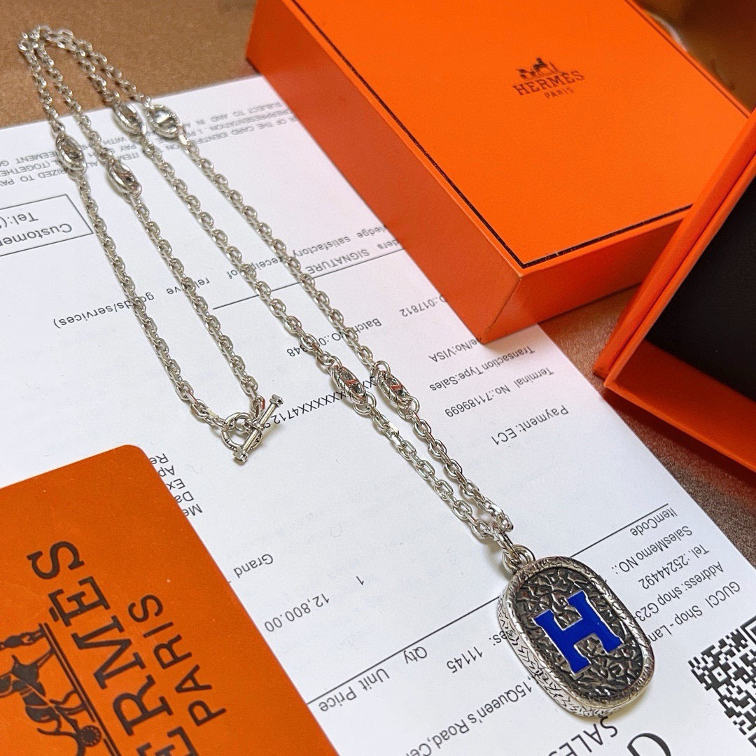 Hermès Silver-Tone Blue H Plaque Pendant Necklace - album image 1