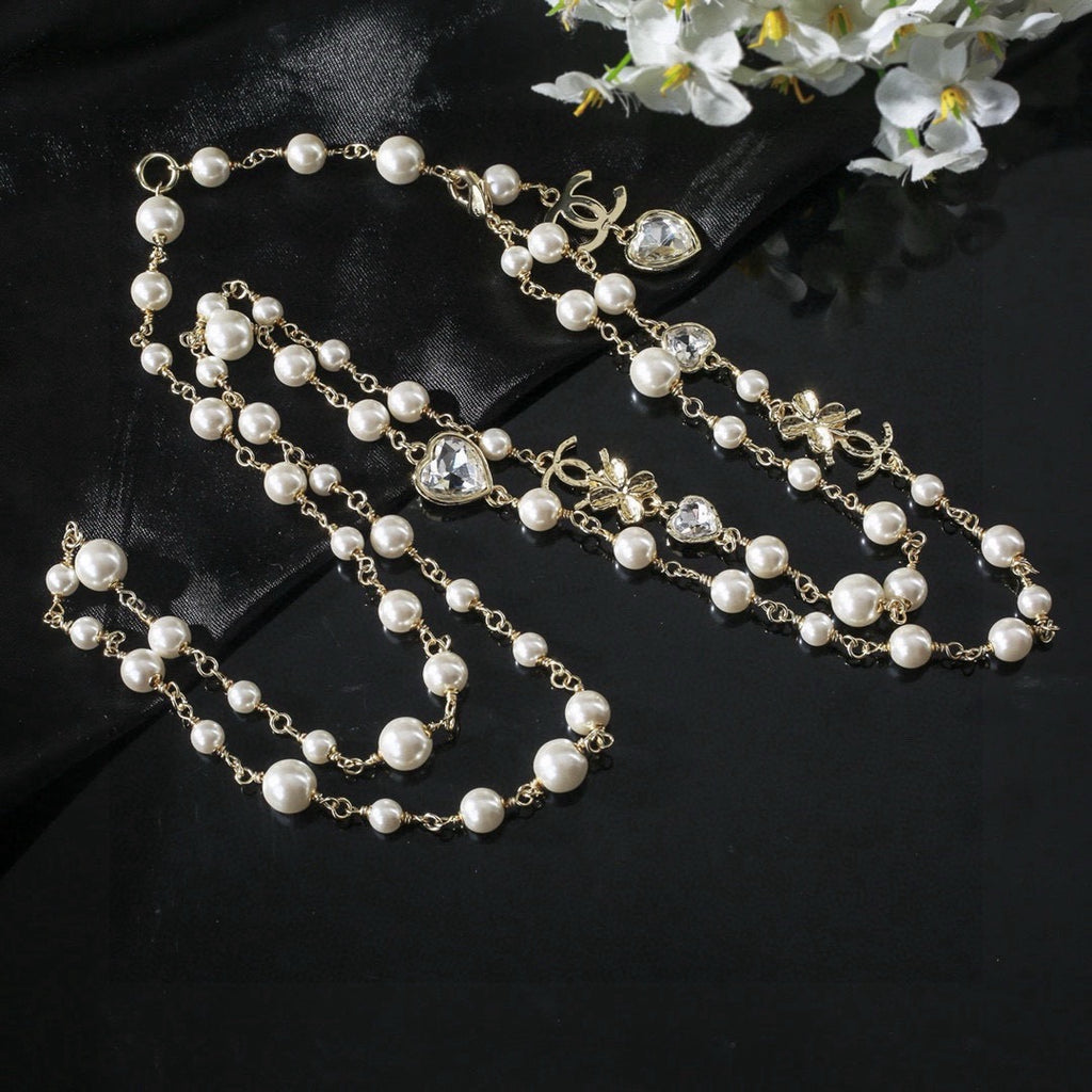 Chanel Pearl and Metallic Bead Necklace - album image 6