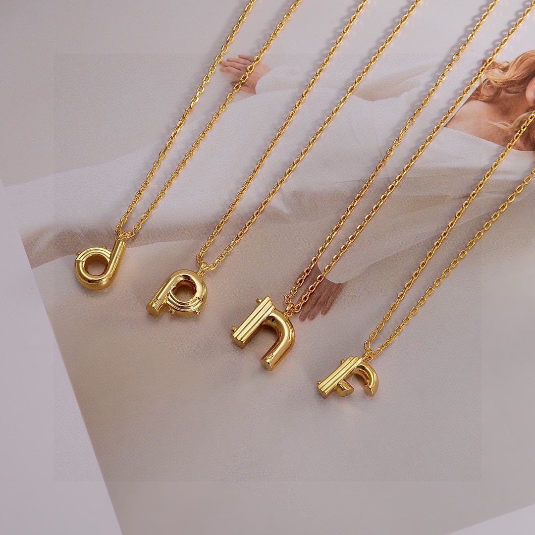 Louis Vuitton Gold-Tone Flower and Oval Charm Necklace - album image 8