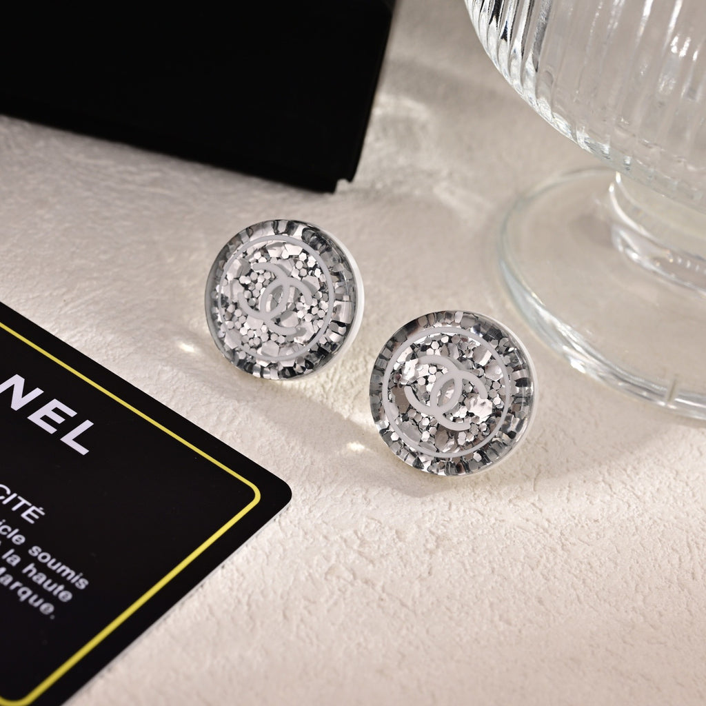 Chanel Silver-Tone Round Medallion Stud Earrings - album image 1
