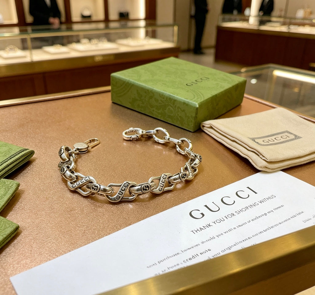 Gucci Silver-Tone Twisted Oval Link Bracelet - album image 2