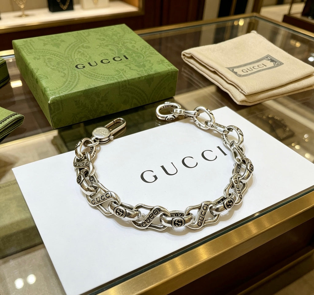 Gucci Silver-Tone Twisted Oval Link Bracelet - album image 4
