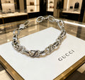 Gucci Silver-Tone Twisted Oval Link Bracelet - album image 1