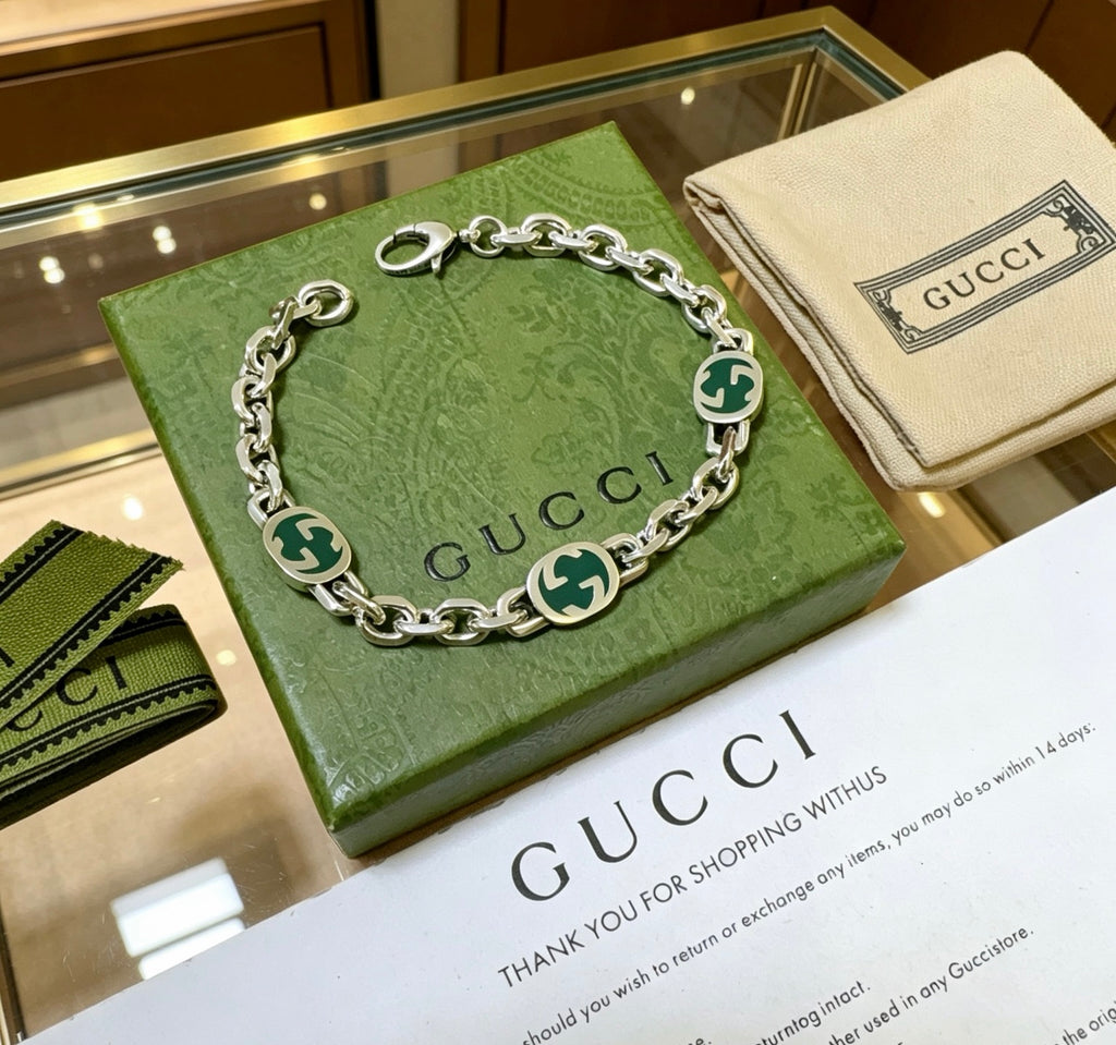 Gucci Silver-Tone GG Link Bracelet - album image 1
