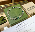 Gucci Silver-Tone GG Link Bracelet - album image 1