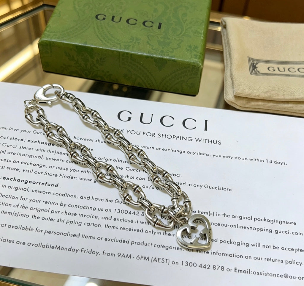Gucci Silver-Tone Openwork Oval Link Bracelet with G Charm - album image 5