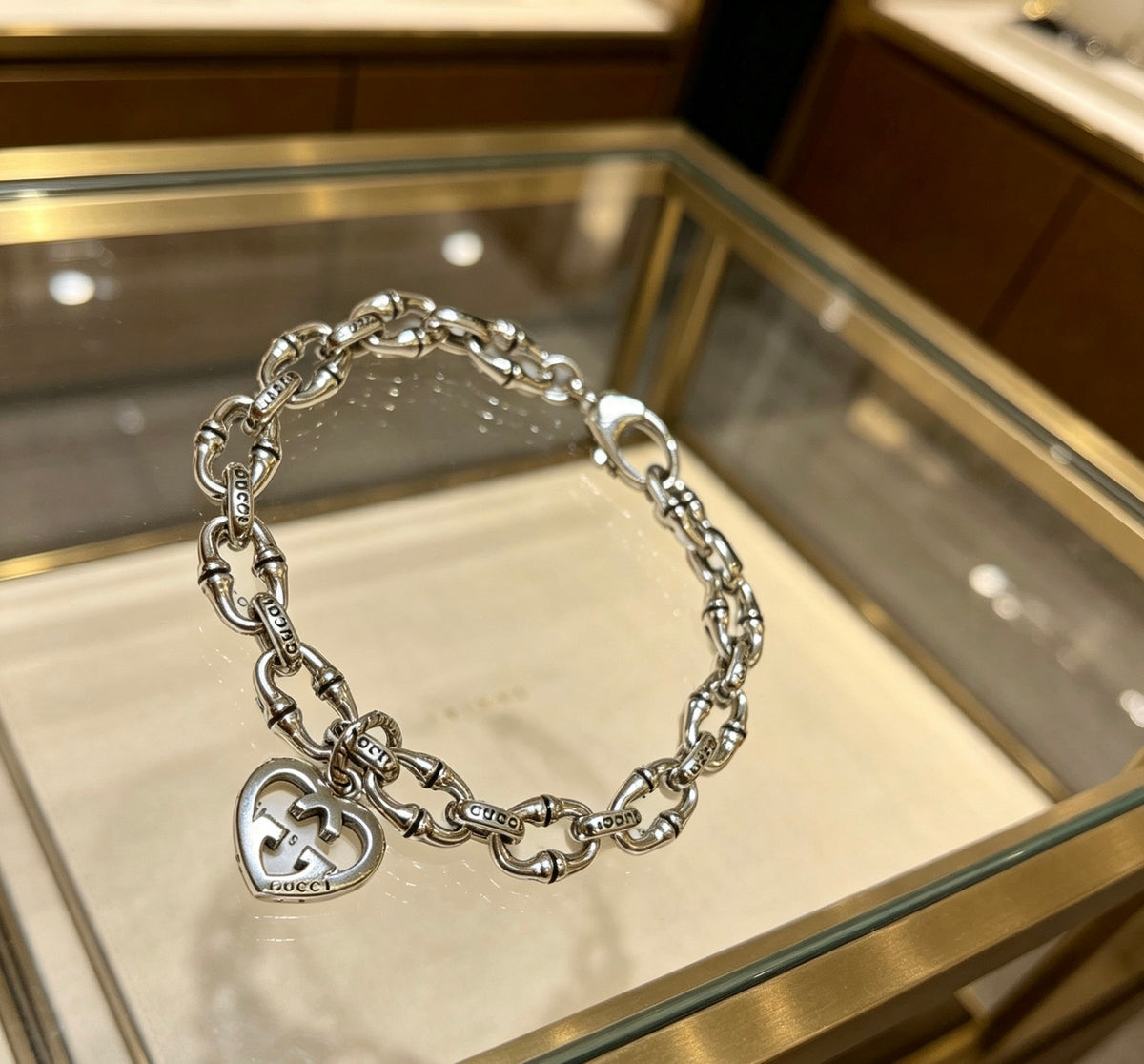Gucci Silver-Tone Openwork Oval Link Bracelet with G Charm - album image 2