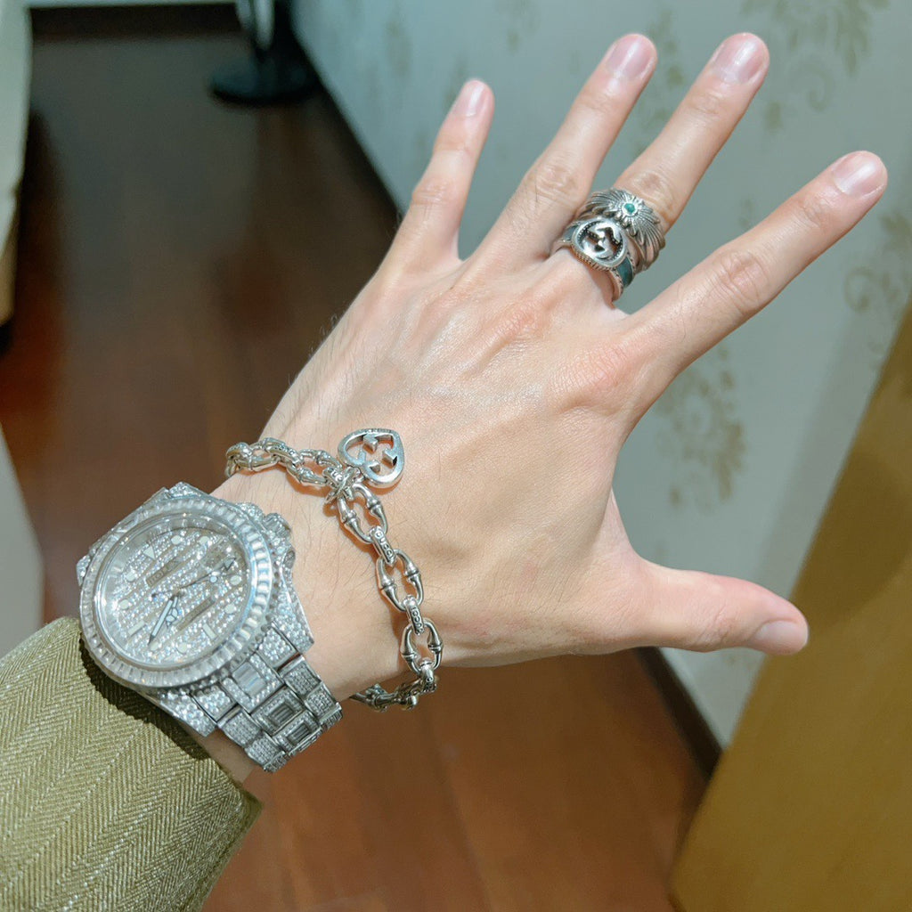 Gucci Silver-Tone Openwork Oval Link Bracelet with G Charm - album image 3