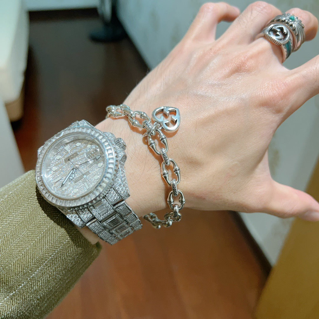Gucci Silver-Tone Openwork Oval Link Bracelet with G Charm - album image 9