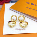 Louis Vuitton Heart Polished Earrings - album image 1