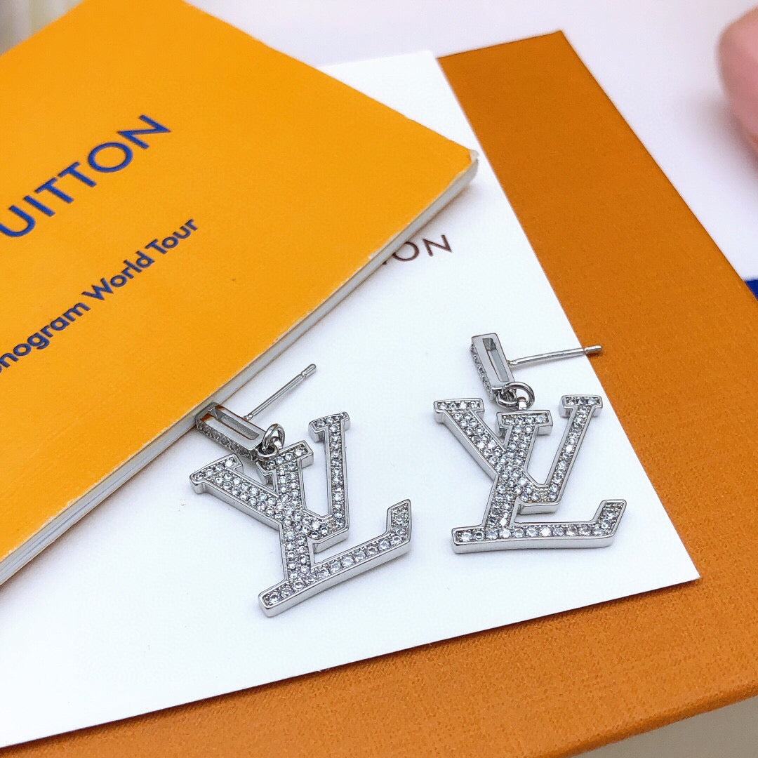 Louis Vuitton Silver-Tone Pendant Crystal Accent Earrings - album image 1