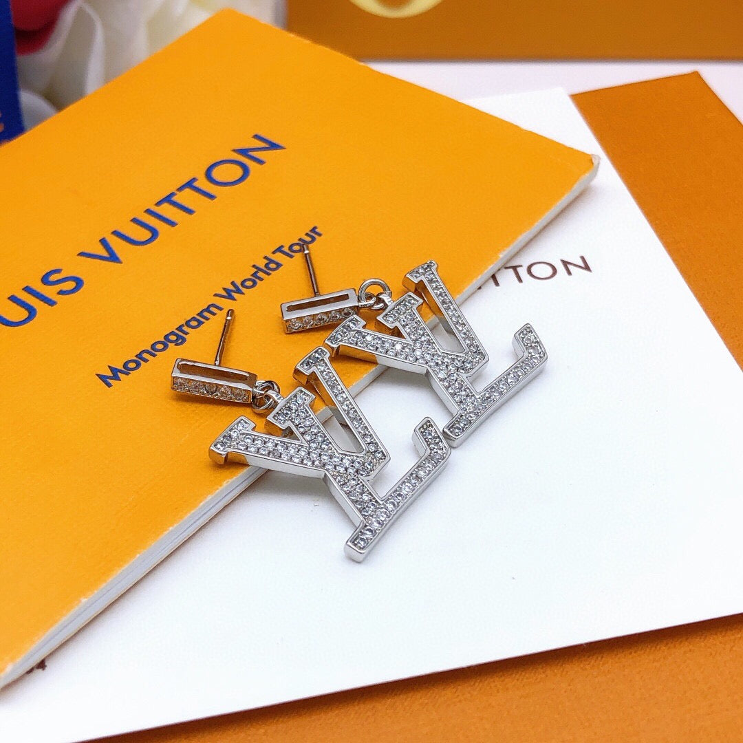 Louis Vuitton Silver-Tone Pendant Crystal Accent Earrings - album image 3