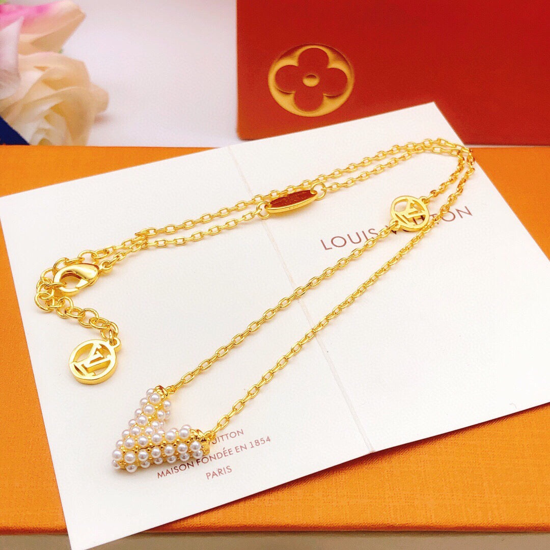 Louis Vuitton Pearl V Letter Necklace - album image 1