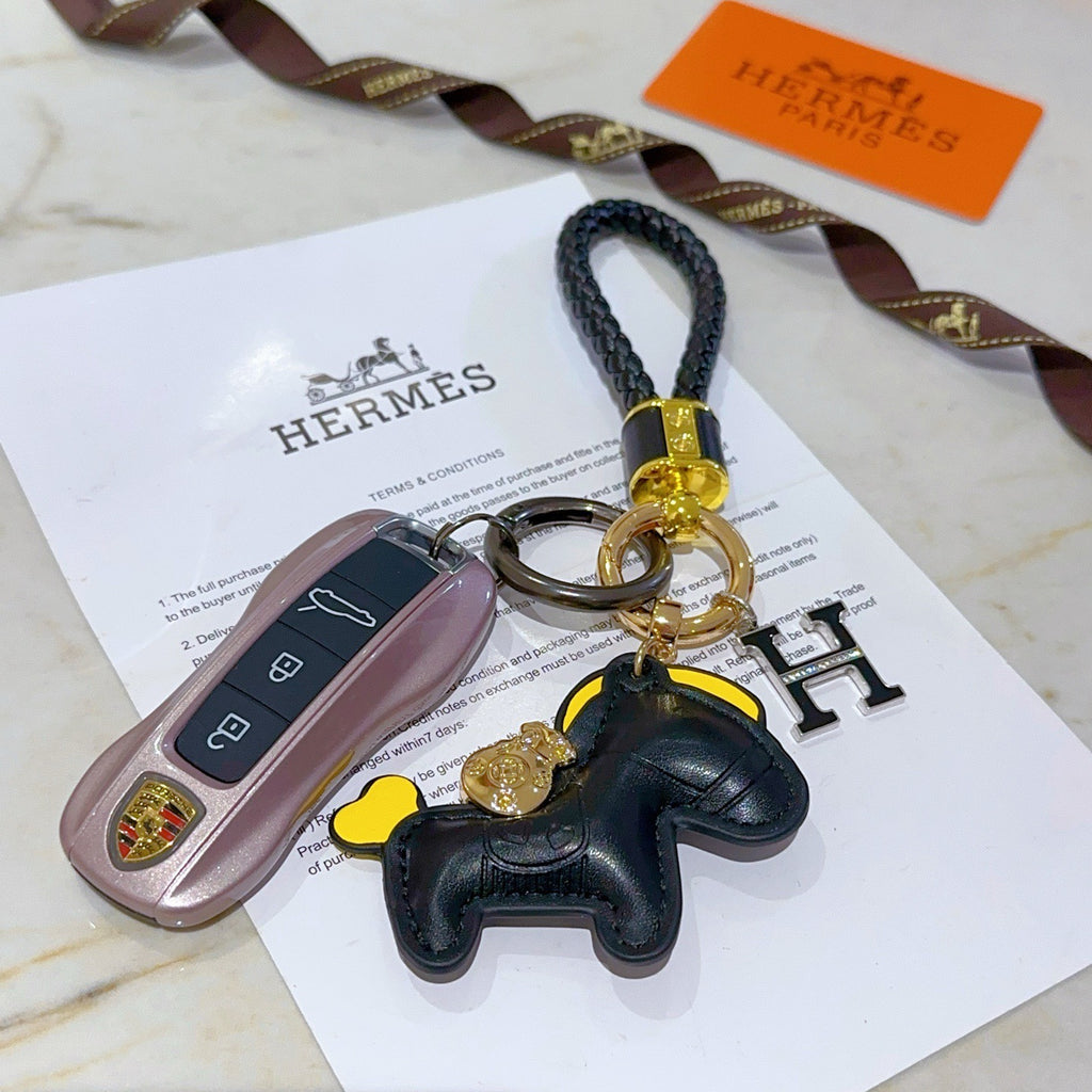 Hermès Black Horse Keychain with Black Braided Cord - album image 6