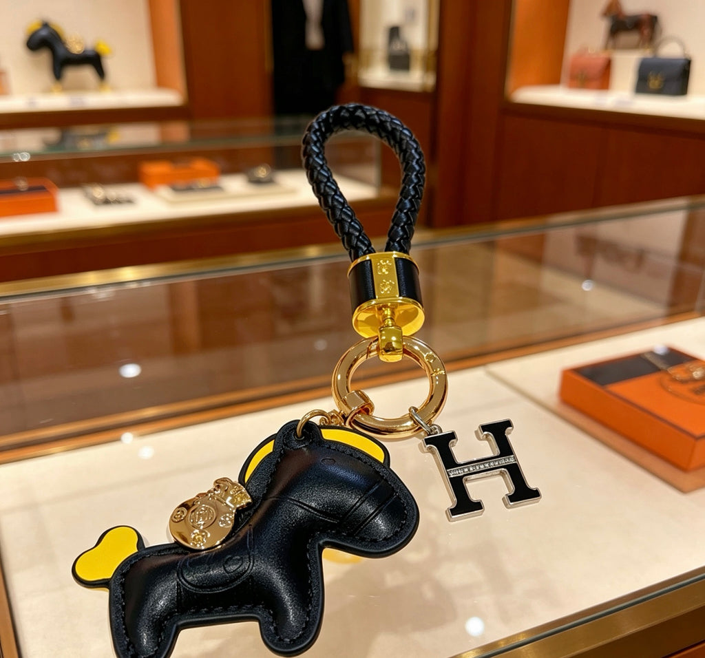 Hermès Black Horse Keychain with Black Braided Cord - album image 4