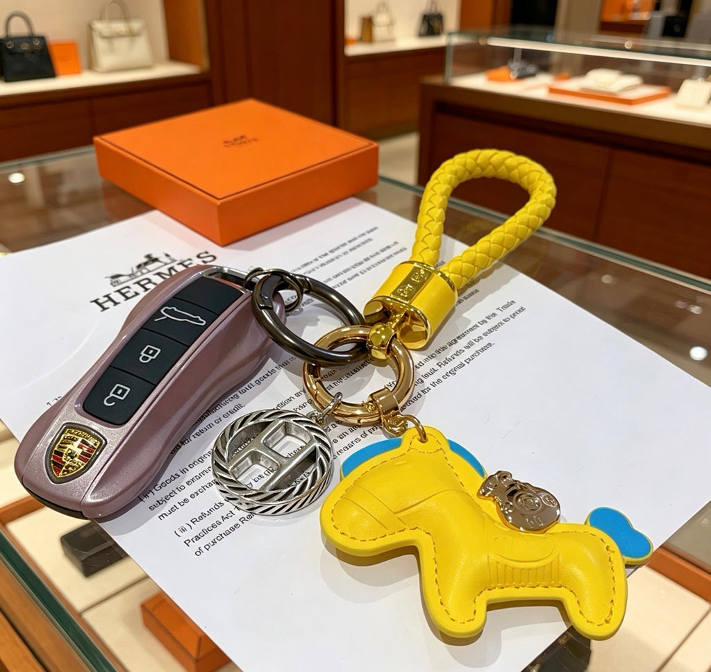 Hermès Yellow Horse Keychain with Yellow Braided Cord - album image 4