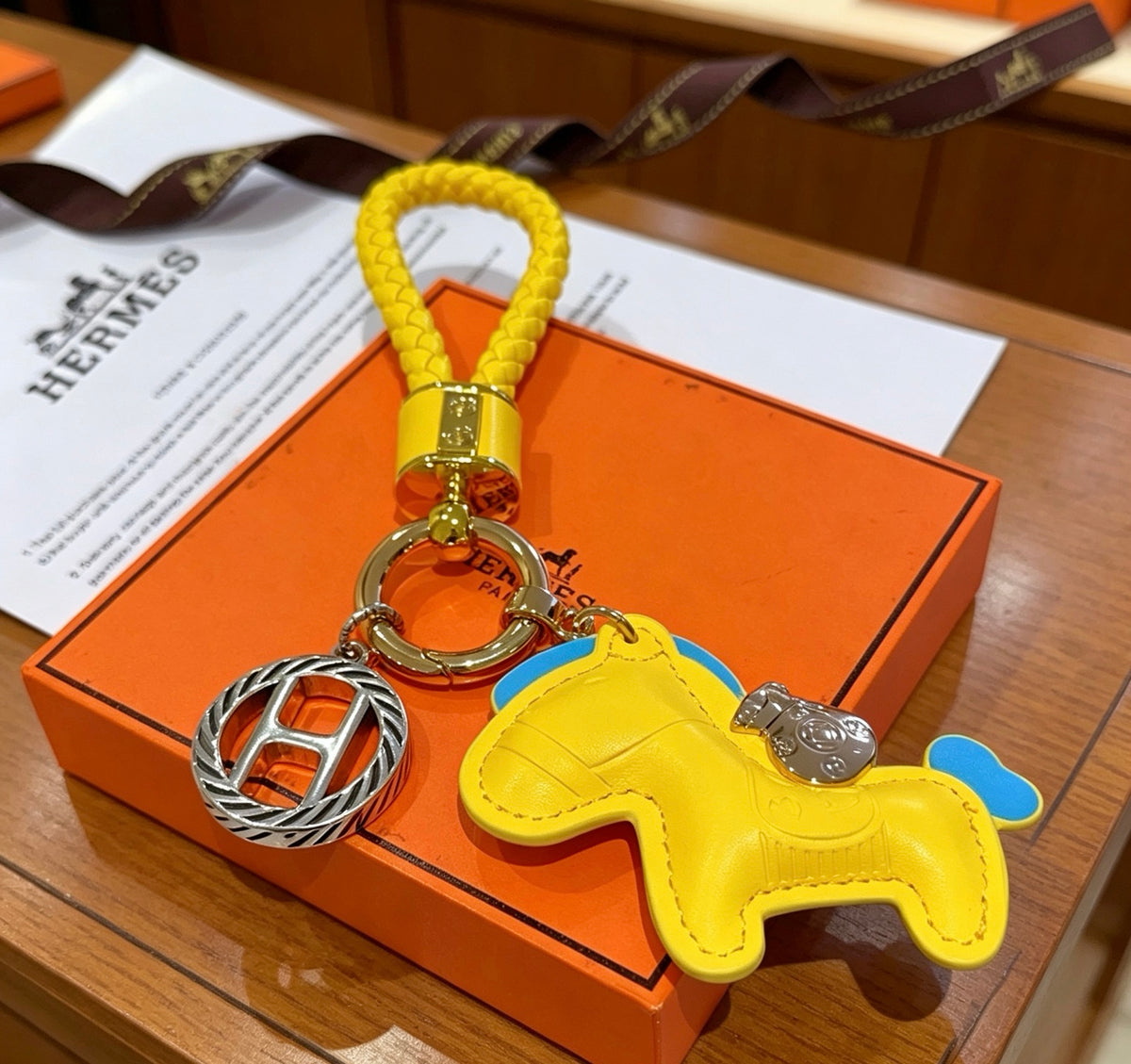 Hermès Yellow Horse Keychain with Yellow Braided Cord - album image 5