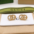 Gucci Interlocking G Crystal Accent Mini Earrings - album image 1