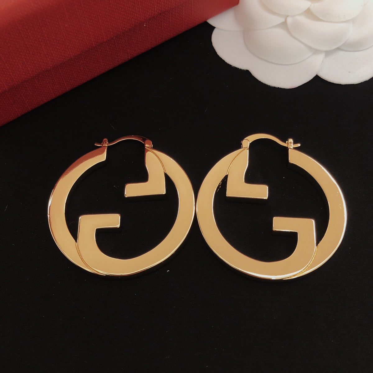 Gucci Circular Polished Earrings - album image 1