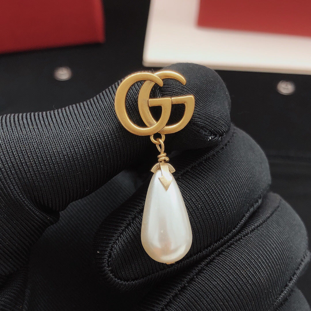 Gucci Teardrop Pearl Earrings - album image 9
