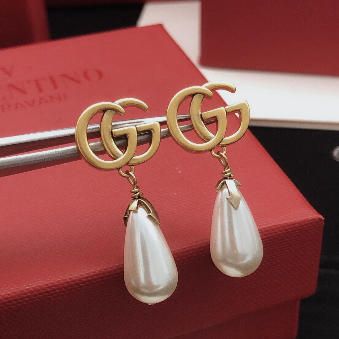 Gucci Teardrop Pearl Earrings - album image 1