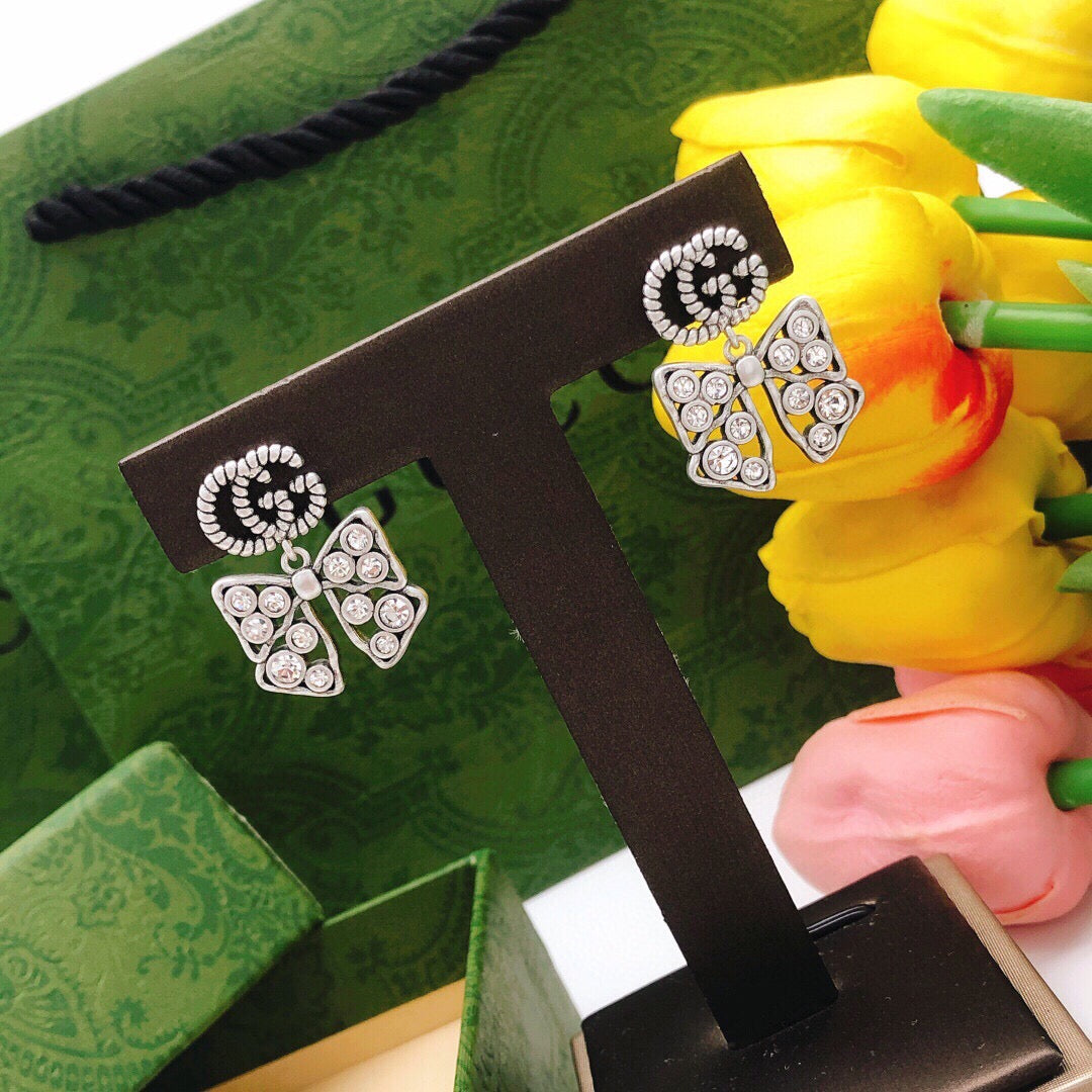 Gucci Interlocking G Bow Butterfly Silver-Tone Gold-Tone Earrings - album image 7