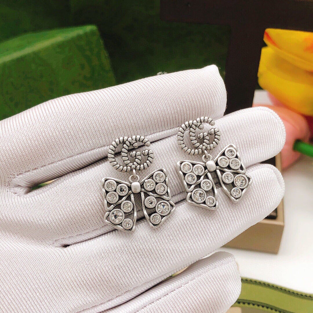 Gucci Interlocking G Bow Butterfly Silver-Tone Gold-Tone Earrings - album image 6