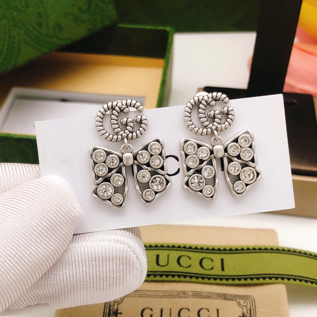 Gucci Interlocking G Bow Butterfly Silver-Tone Gold-Tone Earrings - album image 1