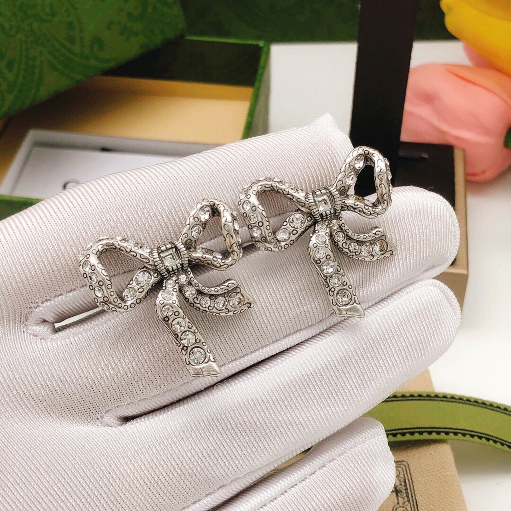 Chanel Bow Butterfly Earrings - album image 2