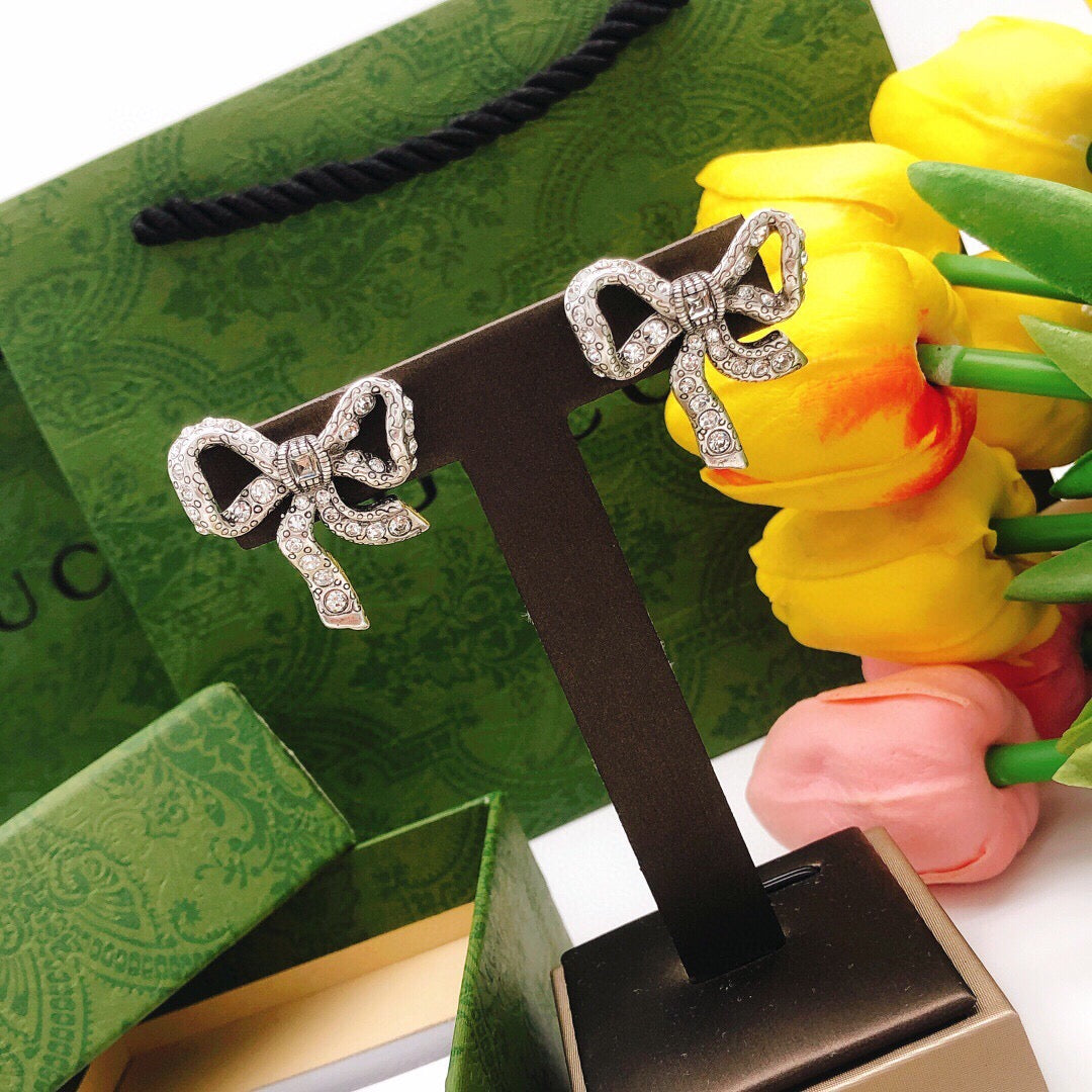 Chanel Bow Butterfly Earrings - album image 6