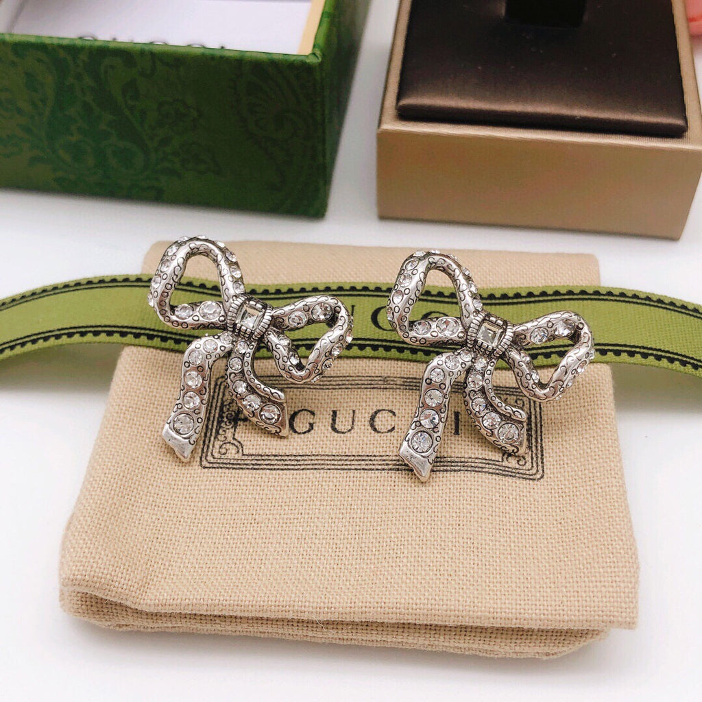 Chanel Bow Butterfly Earrings - album image 3