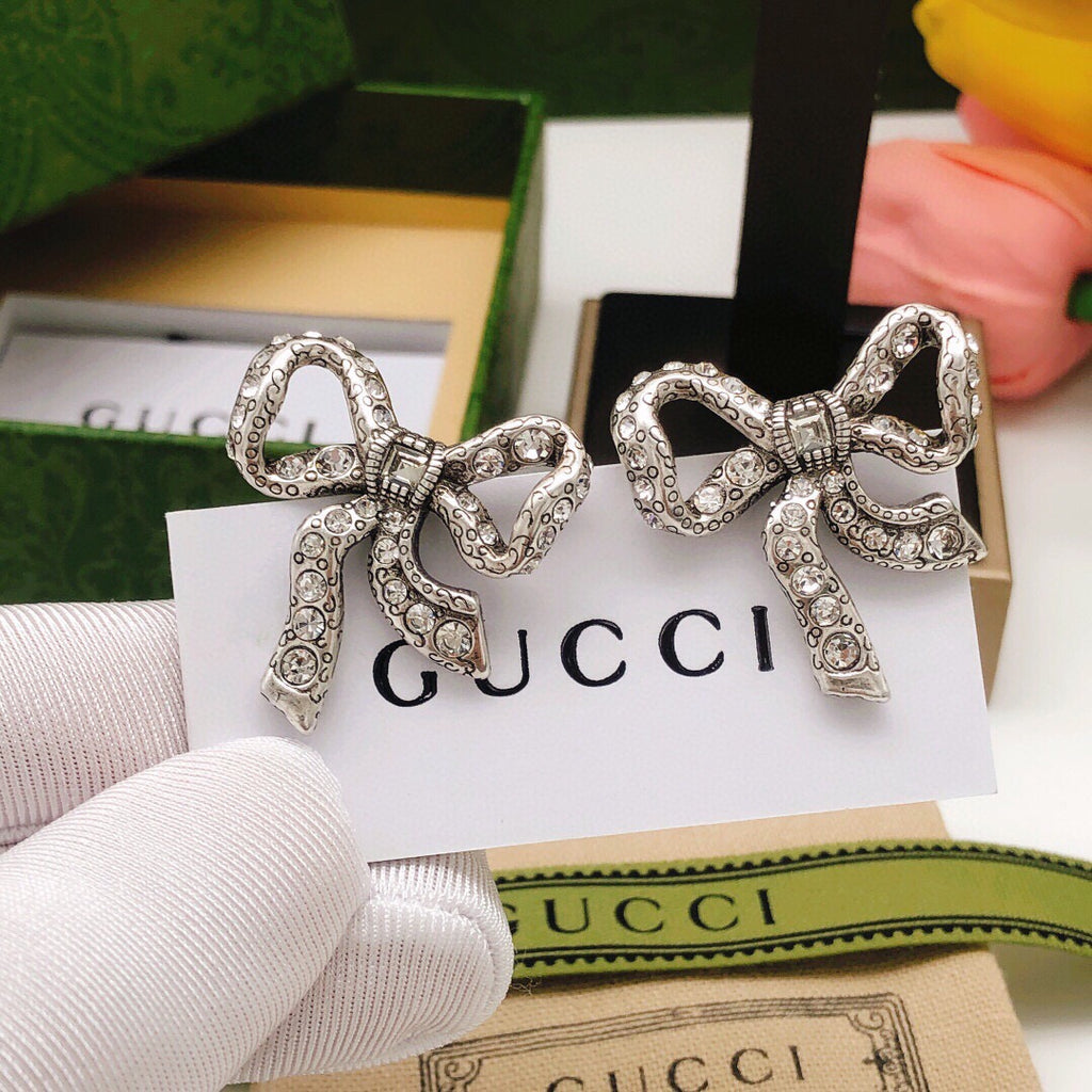 Chanel Bow Butterfly Earrings - album image 1