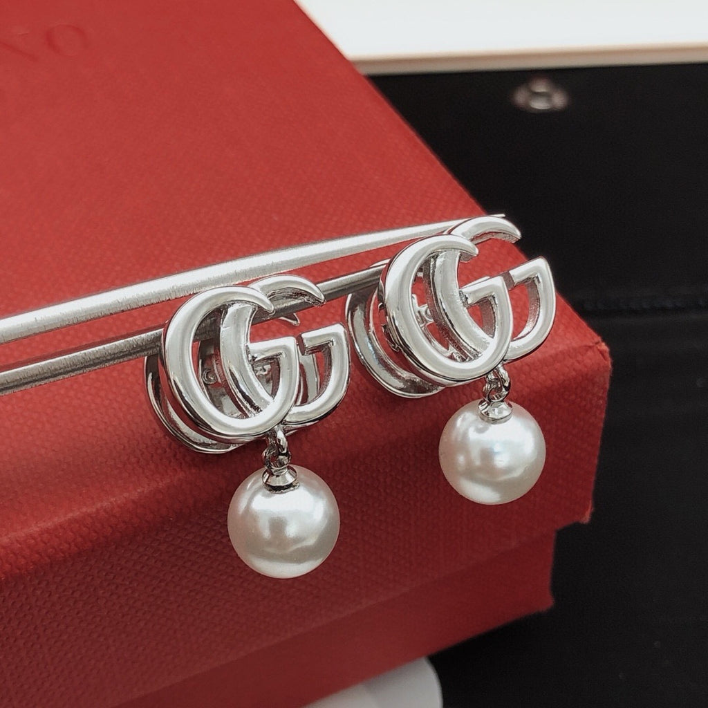 Gucci Pearl Earrings - album image 1