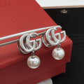 Gucci Pearl Earrings - album image 1