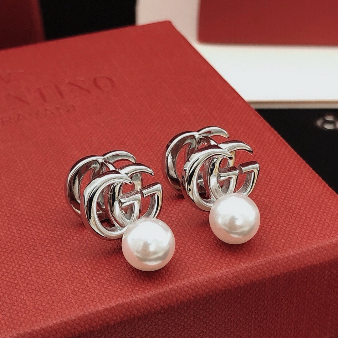 Gucci Pearl Earrings - album image 2
