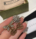 Gucci Interlocking G Bow Butterfly Sunflower Earrings - album image 1