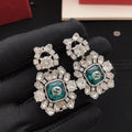 Chanel Gold-Tone Green White Pearl Earrings - album image 1