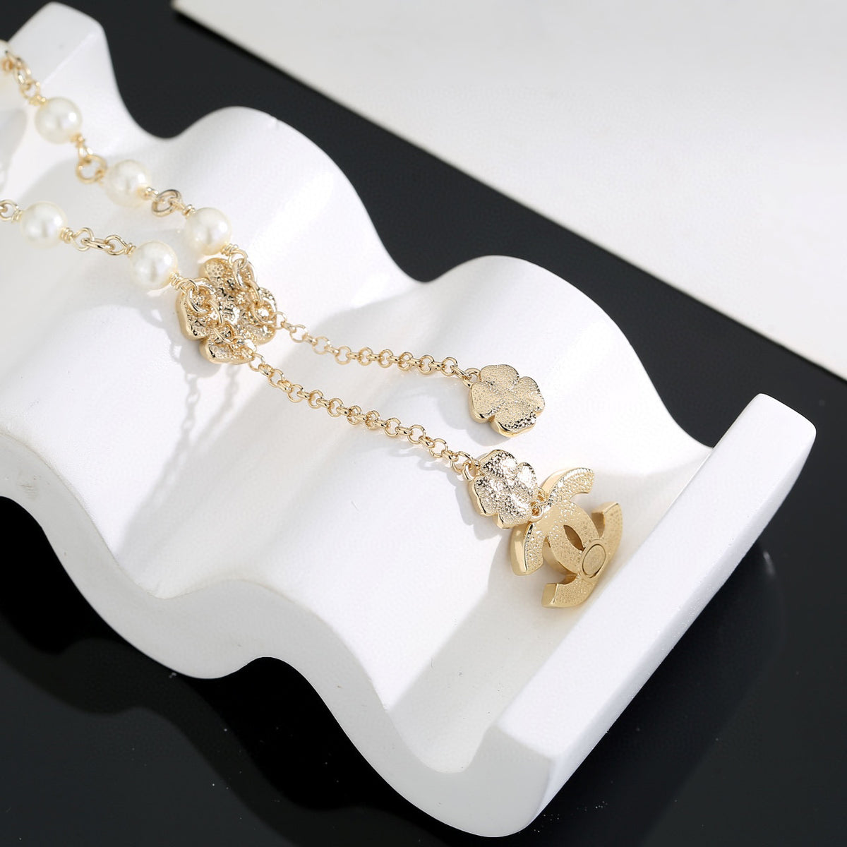 Chanel Interlocking C Pearl Letter Necklace - album image 3